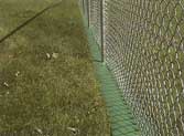 Mowstrip with Chain Link Fence