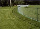 Weed and Grass Barrier for Fences