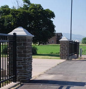 Ornamental Fence with Rock Posts
