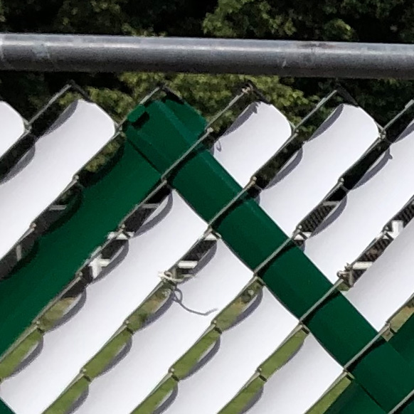 Close up for aluminum slats for chain link fence