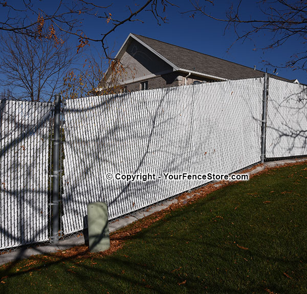 Fence Slats installed on a slope or hill