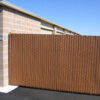 Vinyl Wood Chain Link Fence in a storage complex